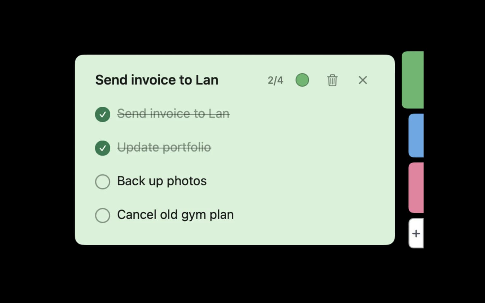 A green note slid out from its tab on the right edge of the screen, two of four tasks ticked